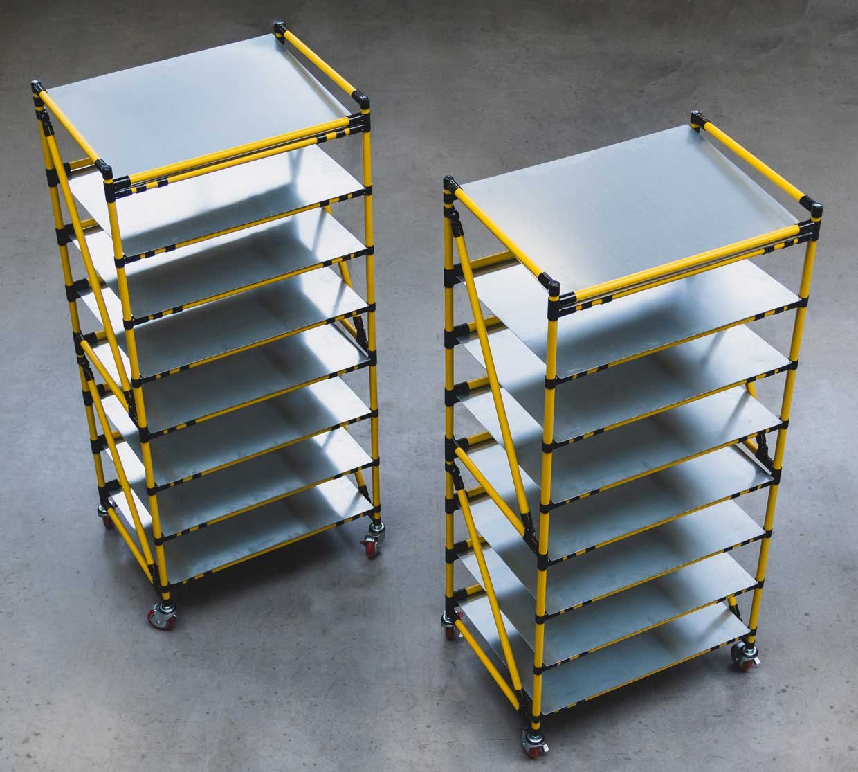 Shelving made of yellow steel tubes with eight levels 