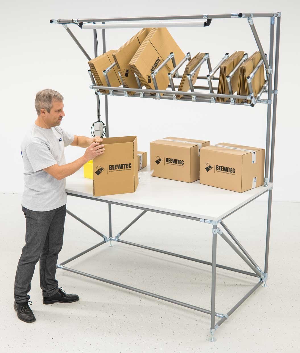Modular packing station made of pipe connector system